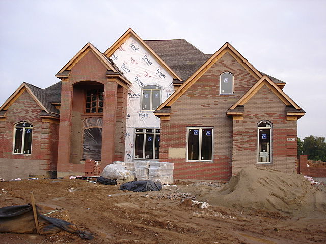 A "McMansion" being built in Louisville, Kentucky. From https://flickr.com/photos/merfam/174212265/ courtesy Wikipedia Commons.