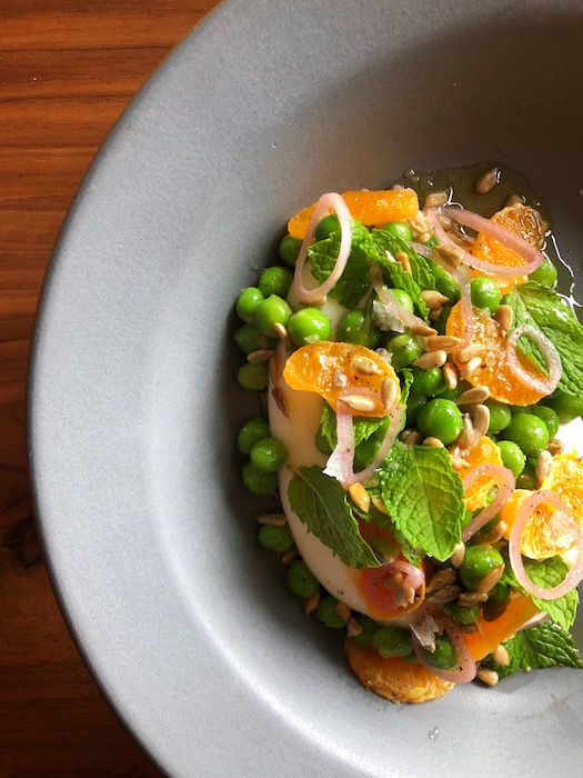 Finch & Fork's Burrata & Spring Peas with preserved lemon, pickled shallots, mint, tangerine, sunflower seeds and grilled artisan bread, courtesy photo.