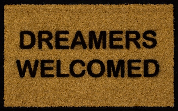 Chris Rupp, Dreamers Welcome, 2018, 18 x 30 inches, acrylic enamel paint on coir door mat, on board, on view at Sullivan Goss Gallery.